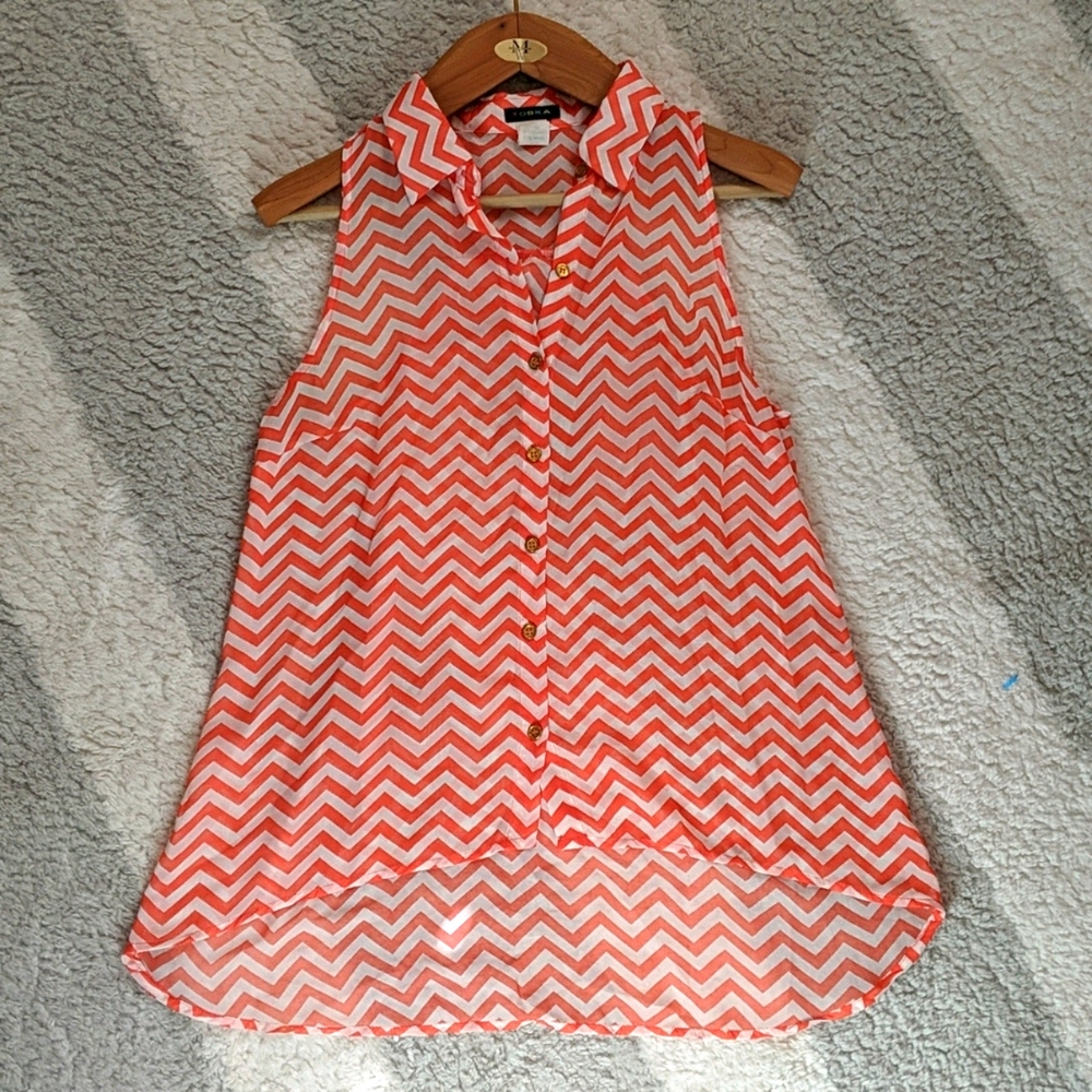 Orange and white top